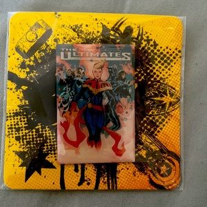 The Ultimates pin with metal backing